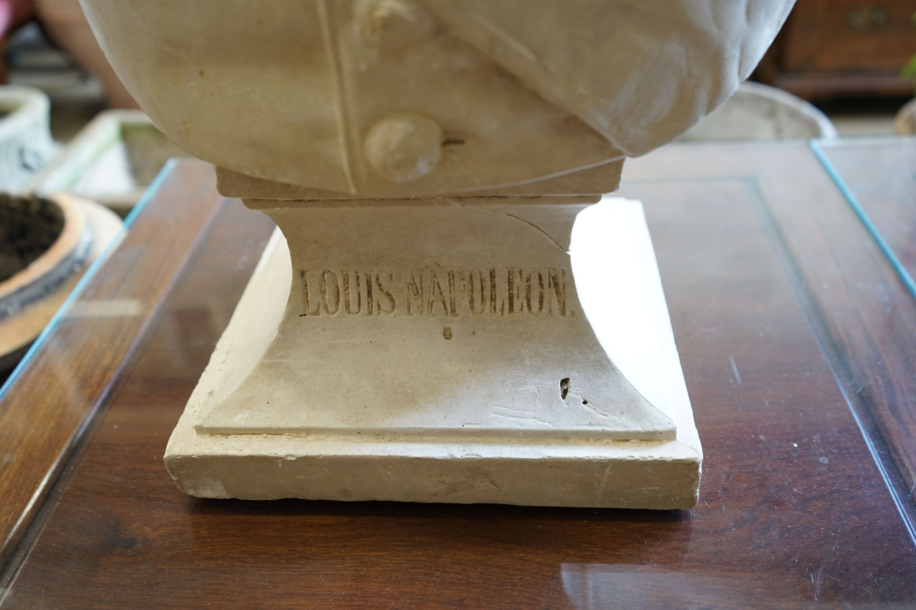 A 'Louis Napolean' faux marble bust, height 82cm